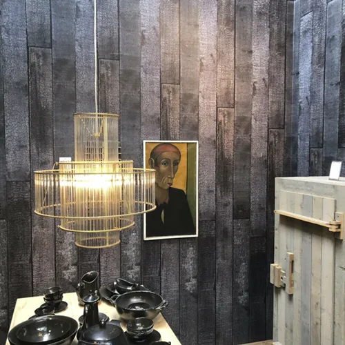 Piet Hein Eek One Mold Lamp as a yellow designer wall light with warm light