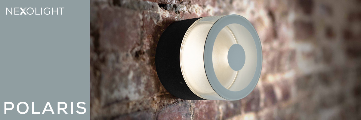 Nexolight Polaris outdoor wall light with round body on a modern brick facade