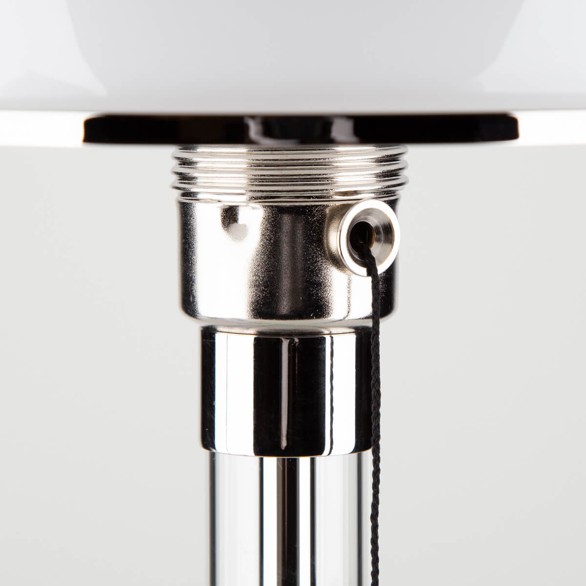 Tecnolumen Wagenfeld Tischleuchte WG 24, Metall vernickelt, Fuß + Schaft: Klarglas (©Leuchtenland.com)