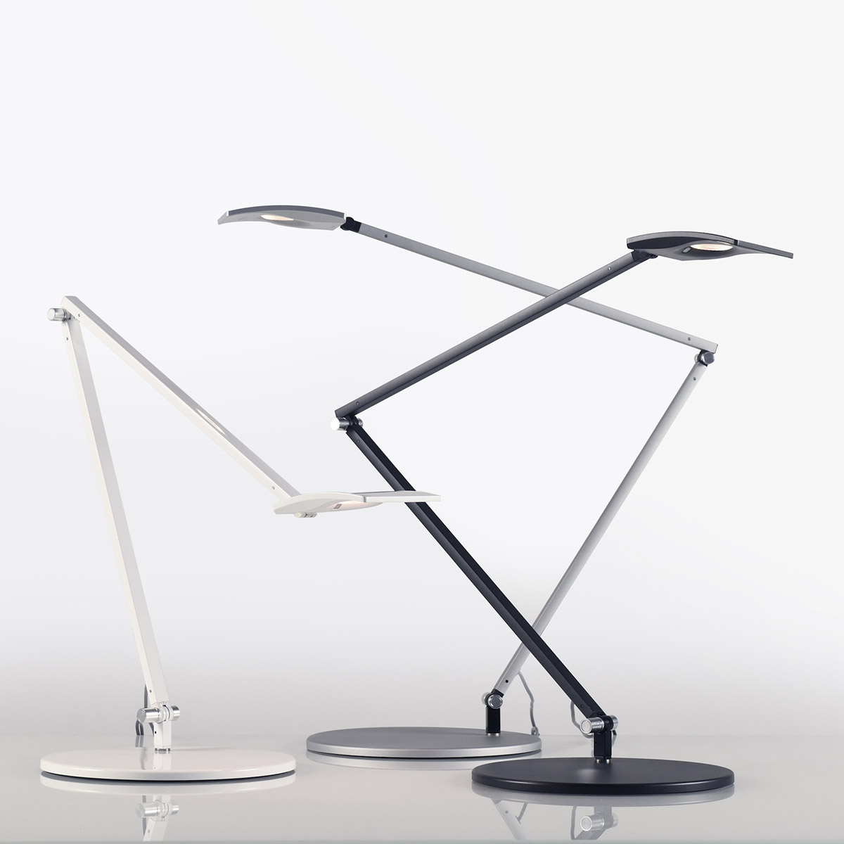 koncept Mosso Pro LED Tischleuchte, weiß, Silber und schwarz (v.l.n.r.)