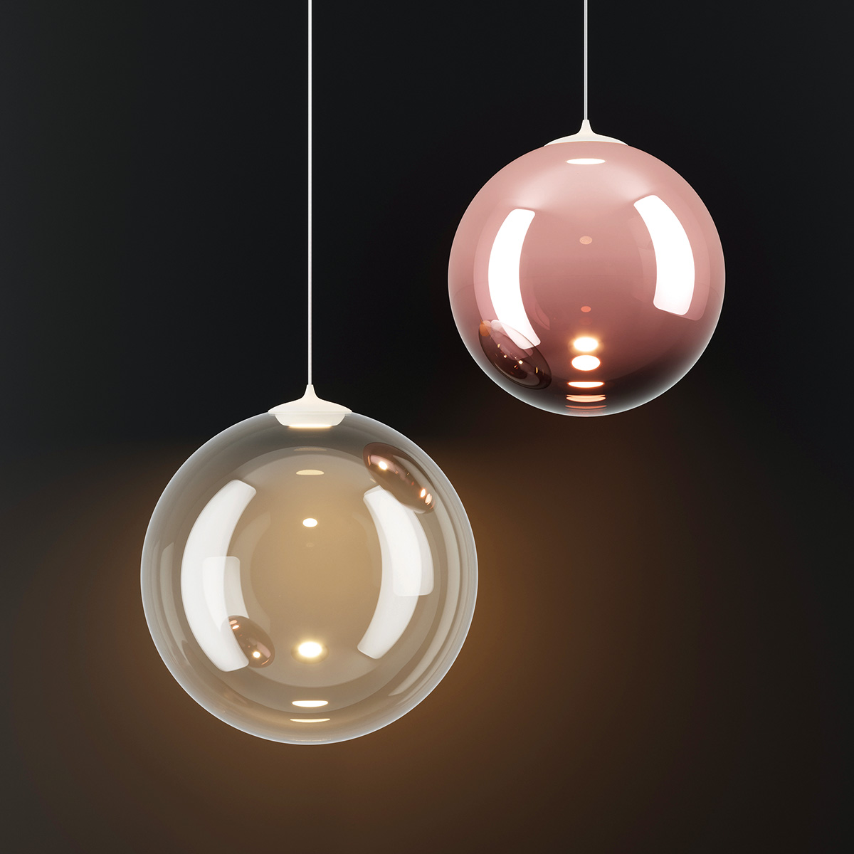 Lodes Random Solo 12 LED Pendelleuchte, die Abbildung zeigt die Leuchte in Roségold und Glas klar in versch. Größen