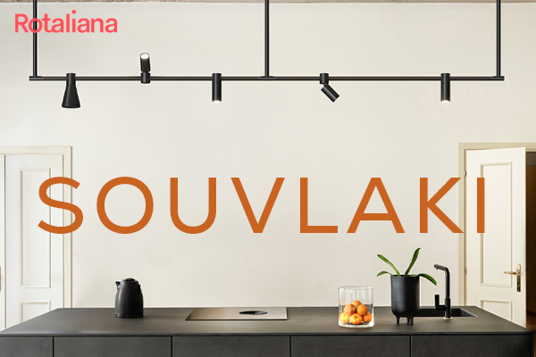 Rotaliana Souvlaki lighting system with flexible LED spotlights above a modern kitchen island