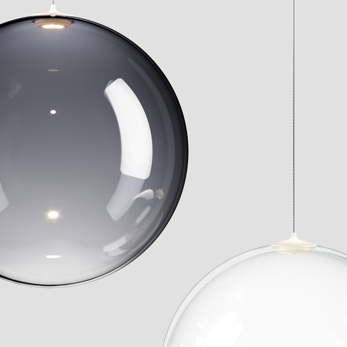 Lodes Random Solo 12 LED Pendelleuchte, die Abbildung zeigt ein Detail des rauchfarbenen und weiß matt satinierten Glases