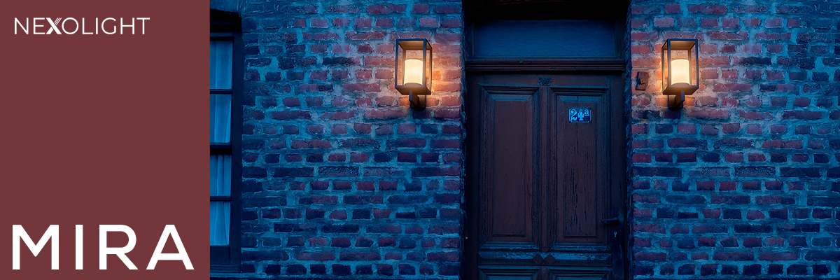 Nexolight Mira outdoor wall lights with warm light on a brick facade at a house entrance