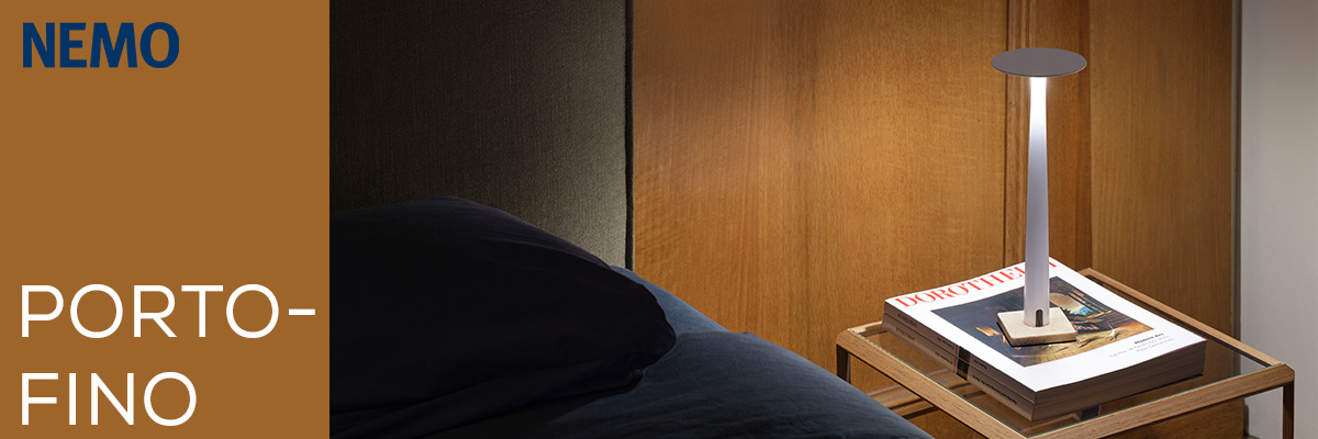 Nemo Portofino portable lamp on bedside table in a modern bedroom