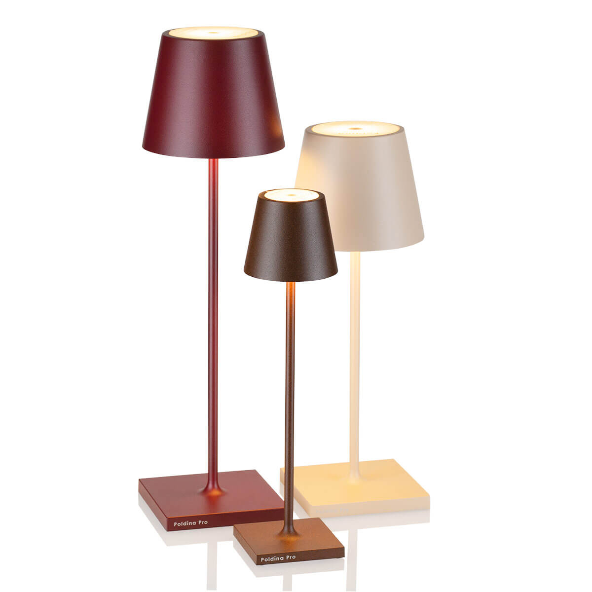 Zafferano AiLati Poldina Pro LED Akkuleuchte, bordeaux, Poldina micro Pro LED Akkuleuchte, Corten, und Poldina Mini Pro LED Akkuleuchte, sandfarben (v.l.n.r.) (©Leuchtenland.com)