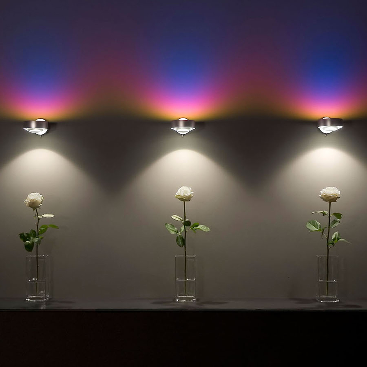 Occhio Sento E verticale Wandleuchte mit Farbfilter blau (oben)